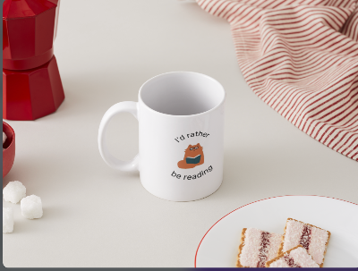 mug with a cat reading a book that says I'd rather be reading